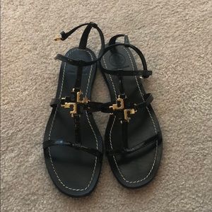Black and golf Tory Burch sandals